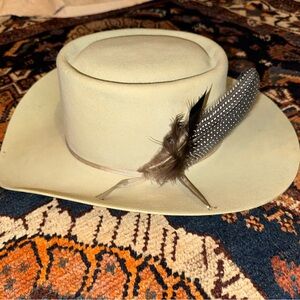 Stetson Cream Cowboy Hat with Wide Brim and Feather Decoration